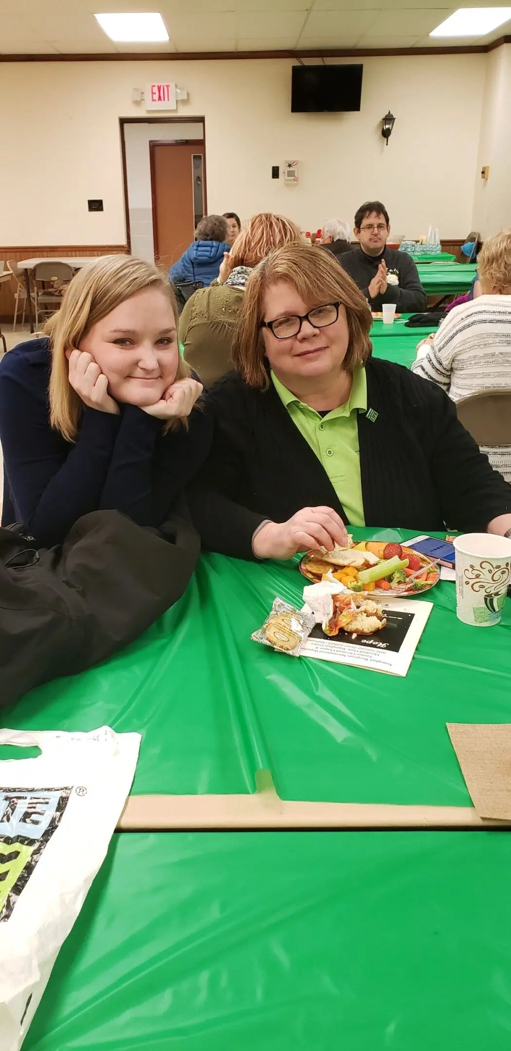 Smiling pair enjoying a meal together