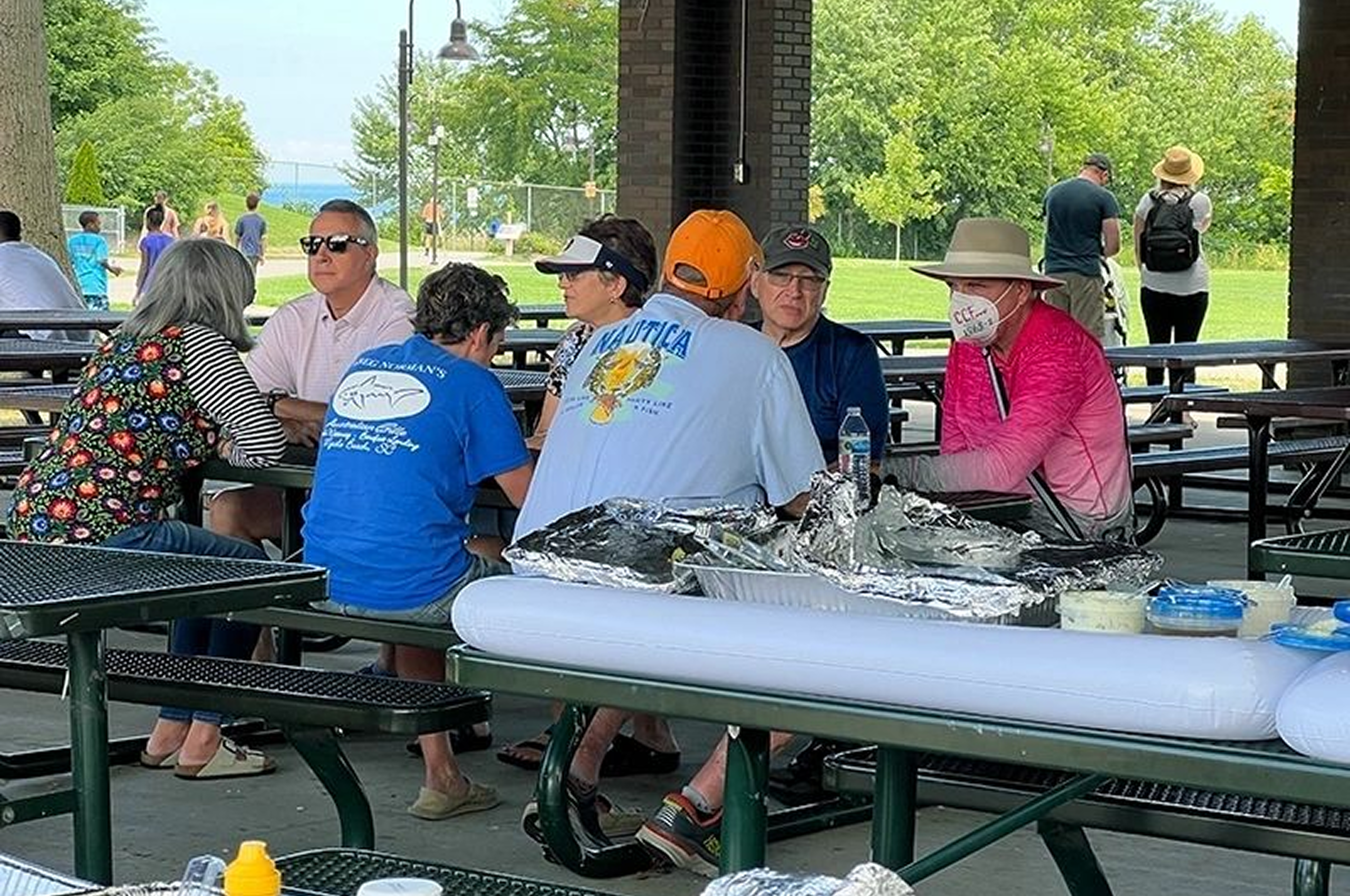 Group chatting at a picnic table