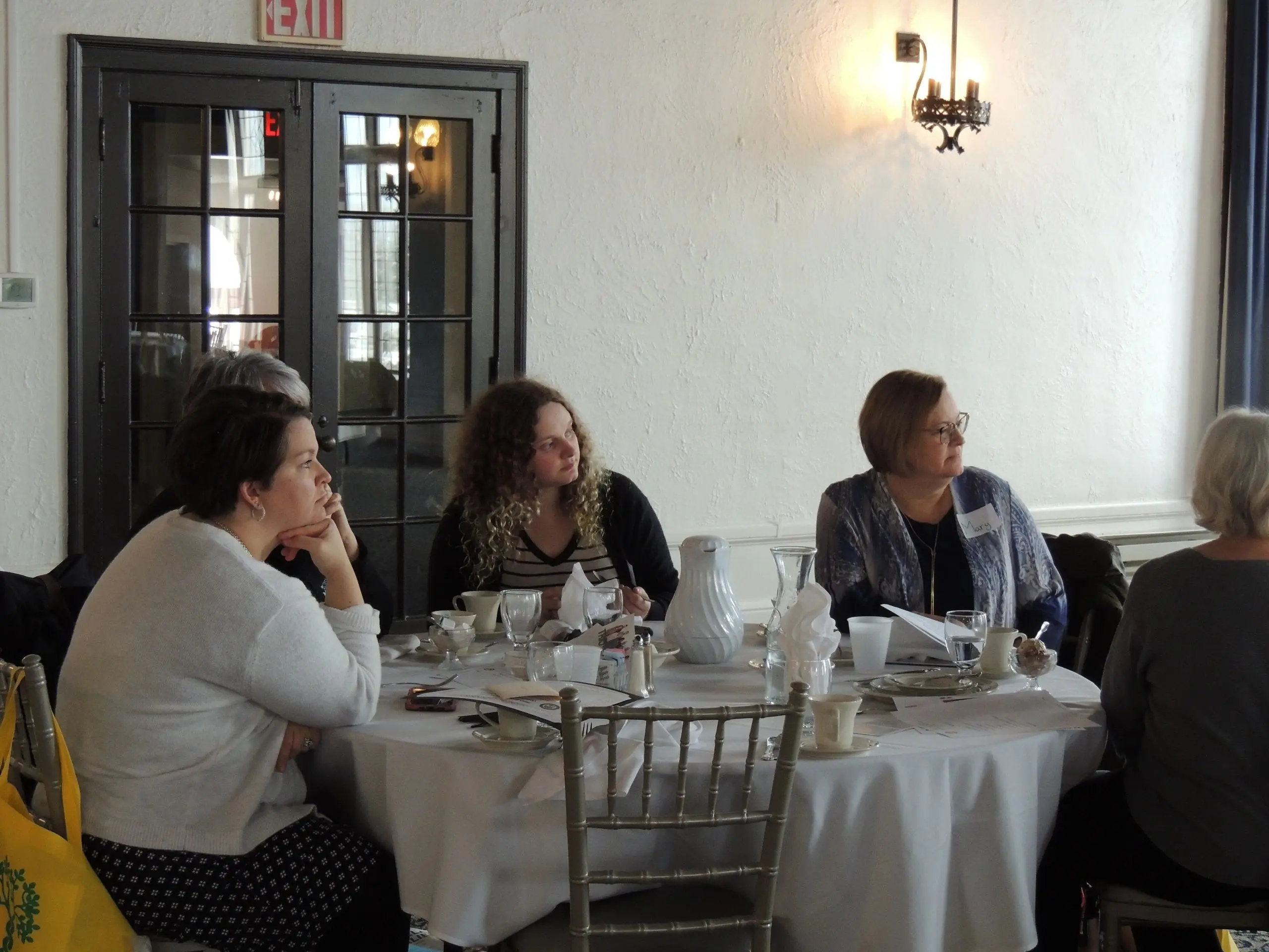 Attendees at a meeting in a restaurant