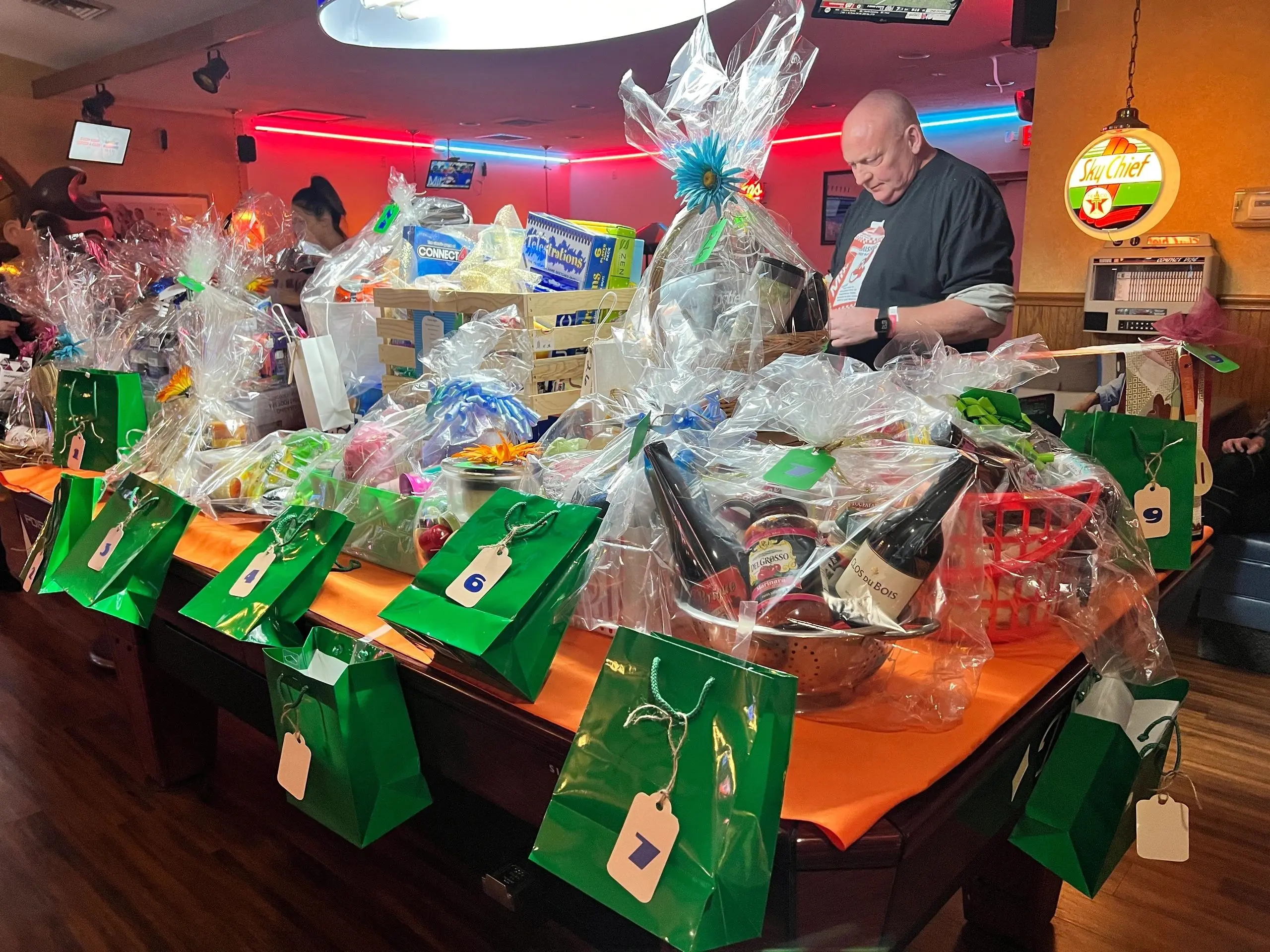 Gift baskets and bags on display table