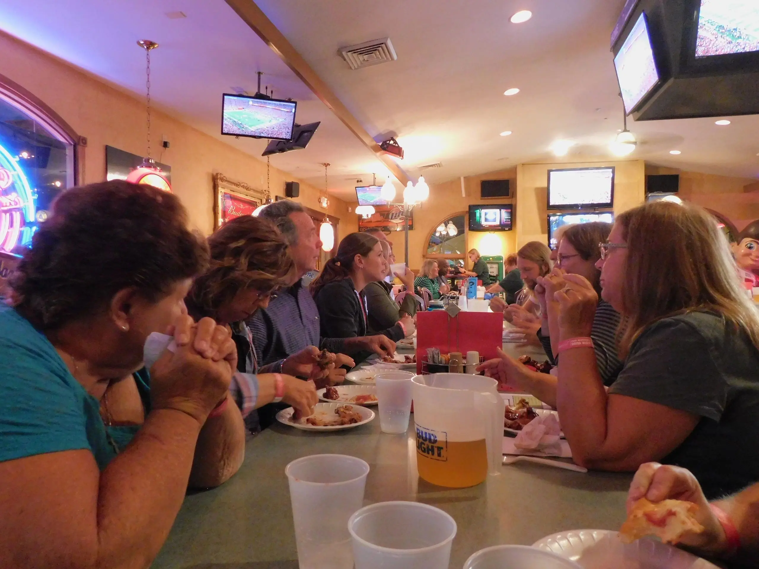 Group enjoying a meal at a table