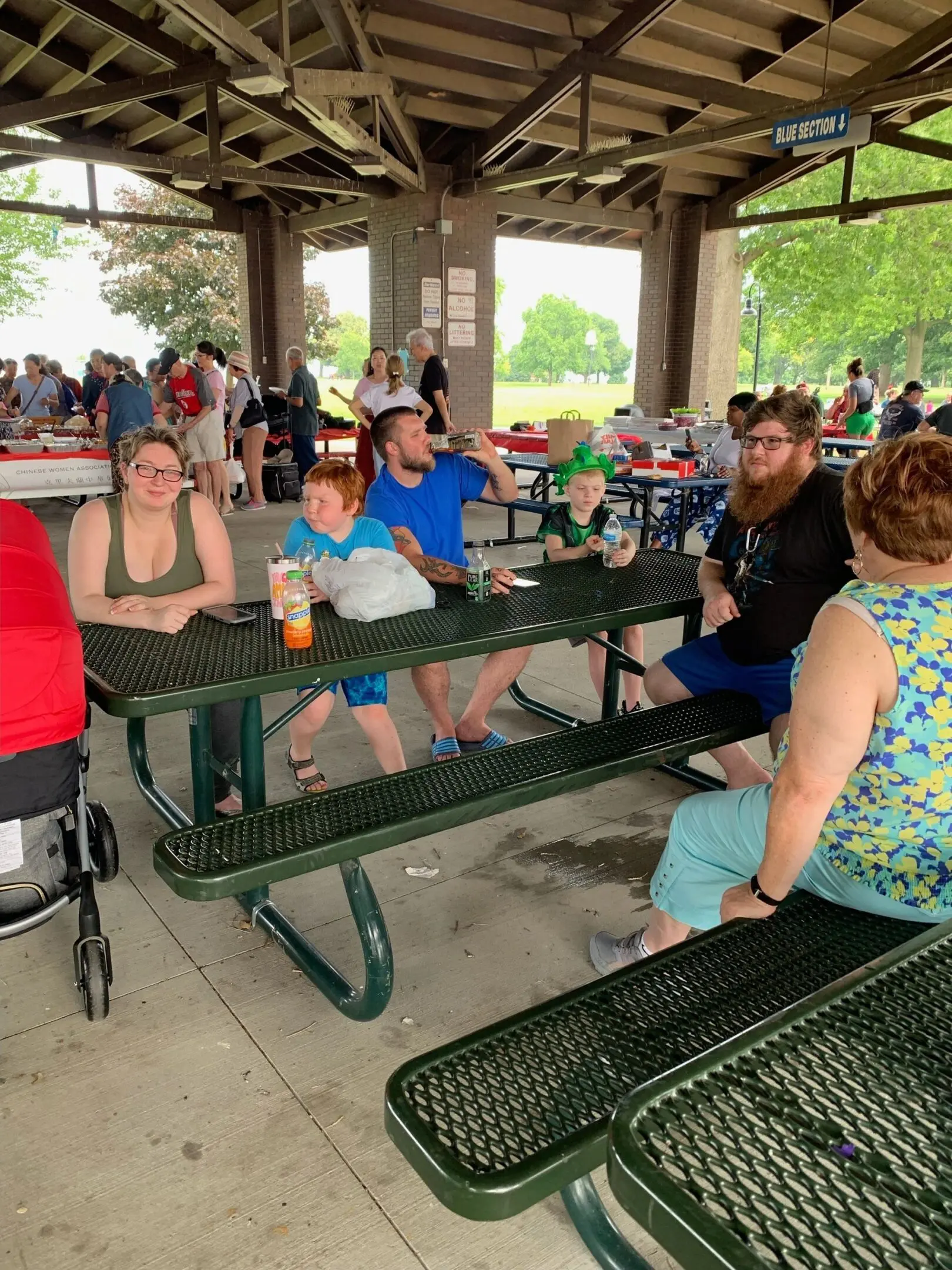 People gathered at a picnic table