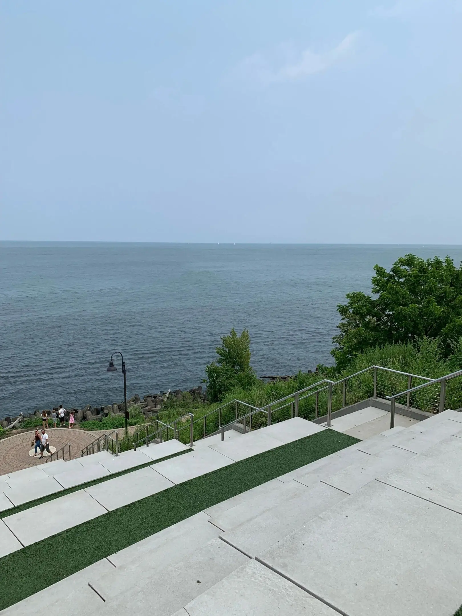 Seaside landscape with greenery and steps