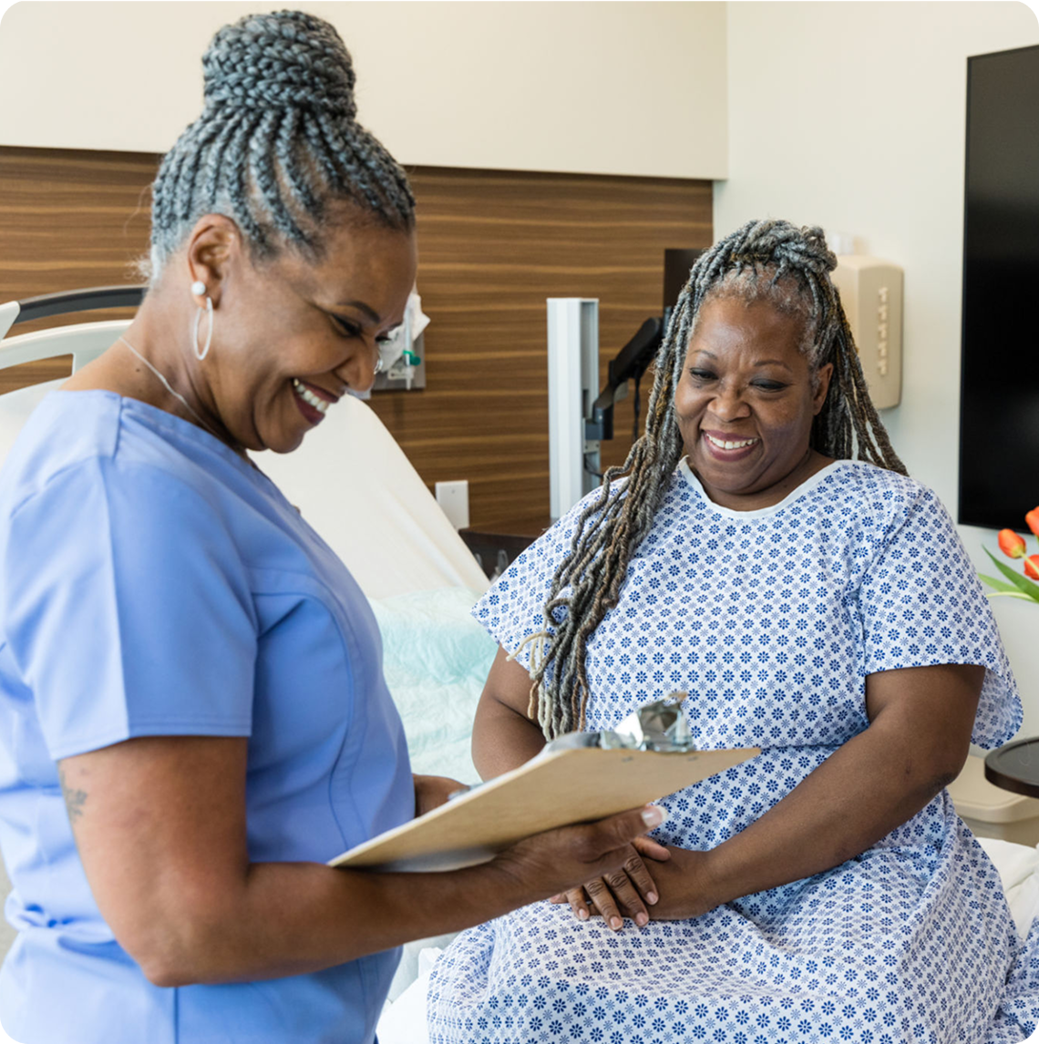 Healthcare professional with patient in clinic