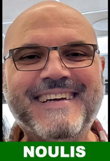 Smiling man with glasses and beard