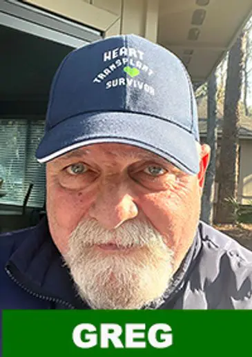 Bearded man outdoors with cap